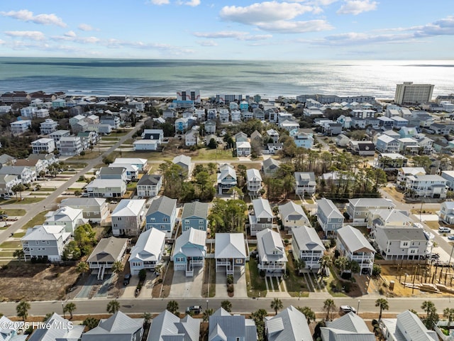 birds eye view of property featuring a residential view and a water view