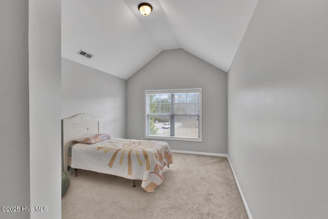 bedroom featuring lofted ceiling, carpet, visible vents, and baseboards