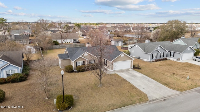 drone / aerial view with a residential view