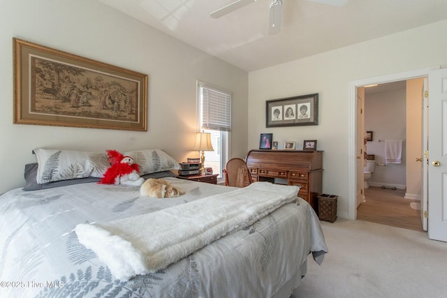 bedroom featuring baseboards, ceiling fan, and light colored carpet