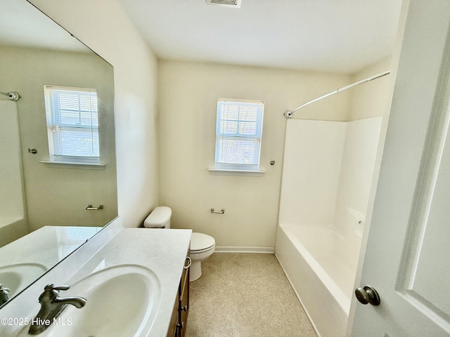 full bath featuring vanity, visible vents, baseboards, bathtub / shower combination, and toilet