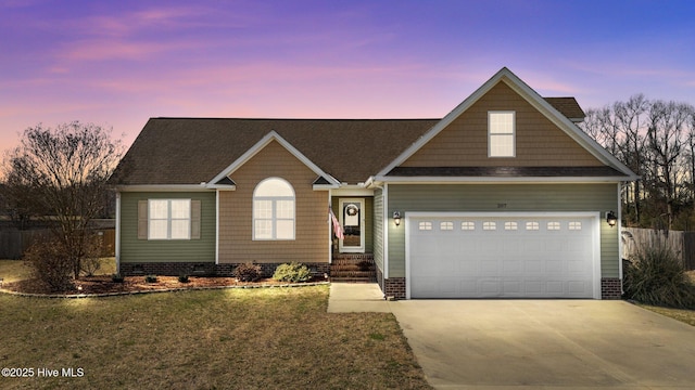 view of front facade featuring concrete driveway and an attached garage