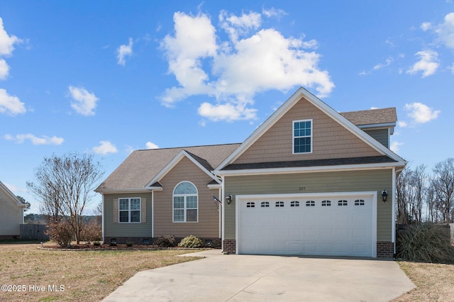 view of front facade featuring a garage, concrete driveway, and a front lawn