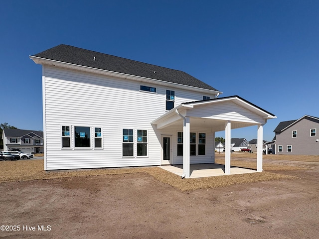 back of house featuring a patio area