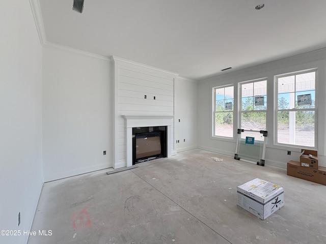 unfurnished living room with visible vents, a large fireplace, baseboards, and ornamental molding