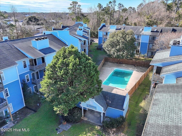 birds eye view of property with a residential view