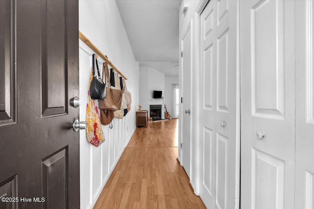 hall with light wood-type flooring