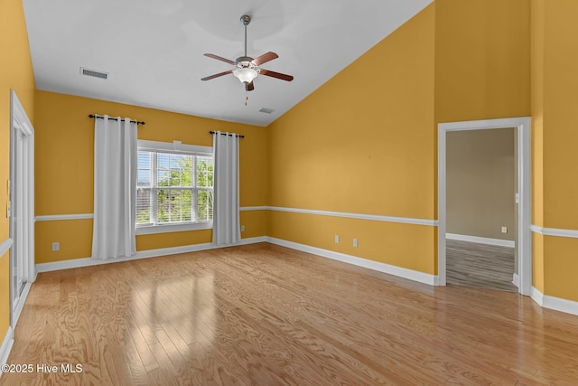 1036 Tideline Dr, Leland, NC 28451 - spare room with light wood finished floors, a ceiling fan, and high vaulted ceiling
