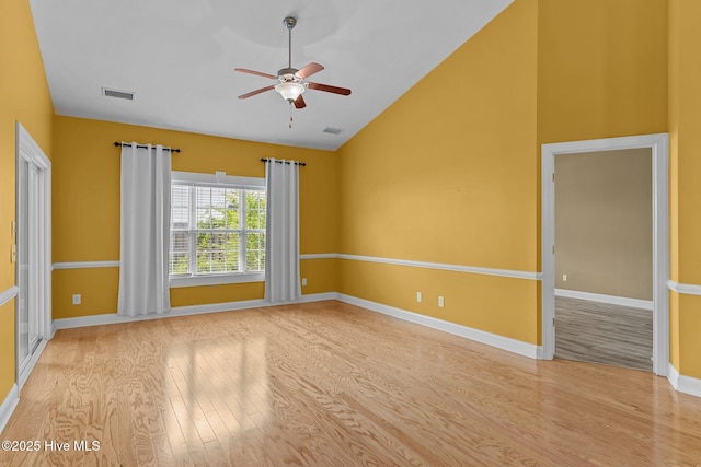 1036 Tideline Dr, Leland, NC 28451 - spare room with wood finished floors, ceiling fan, and high vaulted ceiling