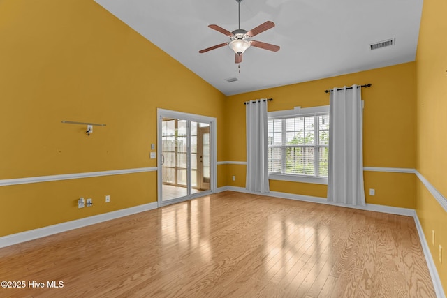 1036 Tideline Dr, Leland, NC 28451 - empty room featuring wood finished floors, a ceiling fan, and high vaulted ceiling
