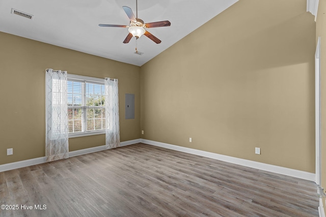 1036 Tideline Dr, Leland, NC 28451 - spare room with wood finished floors, electric panel, ceiling fan, and high vaulted ceiling