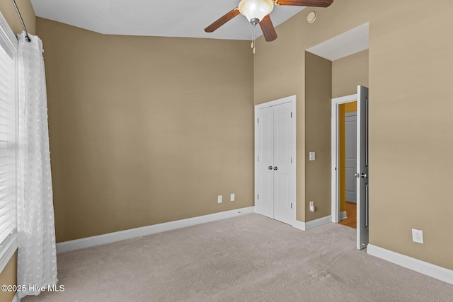 1036 Tideline Dr, Leland, NC 28451 - unfurnished bedroom featuring carpet flooring, a ceiling fan, and a closet
