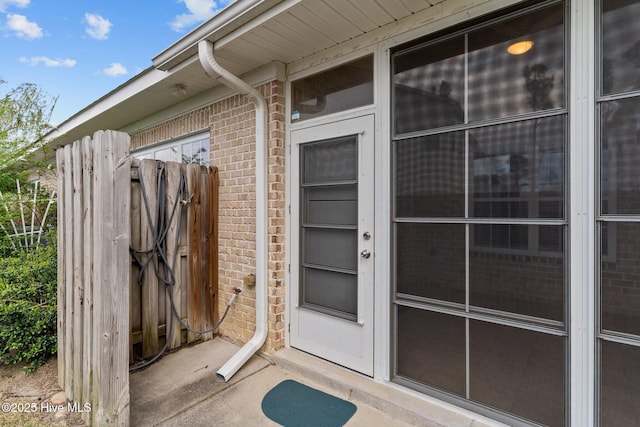 1036 Tideline Dr, Leland, NC 28451 - doorway to property featuring brick siding