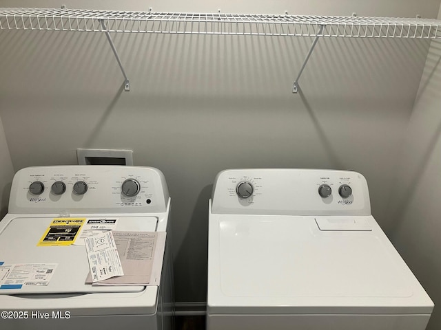 washroom with laundry area and washing machine and clothes dryer