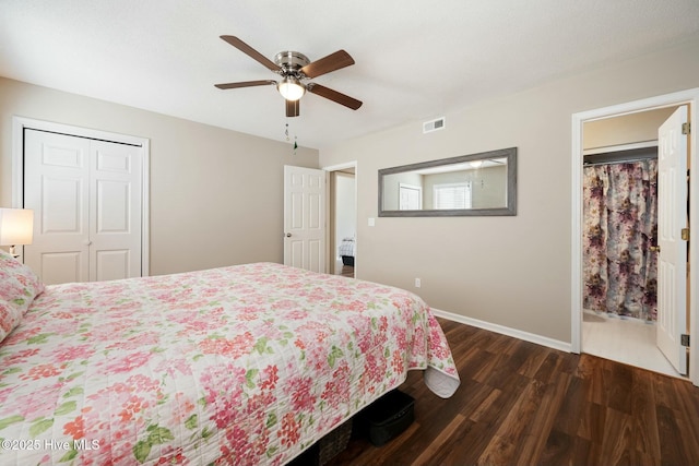 bedroom with baseboards, visible vents, dark wood-style flooring, ceiling fan, and a closet