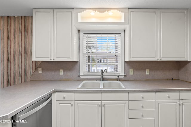 1611 Gores Landing Rd SW ., Unit Ocean Isle Beach, NC 28469 - kitchen featuring white cabinetry, a sink, light countertops, and dishwasher