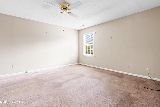 1611 Gores Landing Rd SW ., Unit Ocean Isle Beach, NC 28469 - carpeted spare room featuring baseboards, a textured ceiling, visible vents, and a ceiling fan