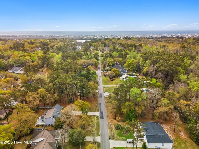 1611 Gores Landing Rd SW ., Unit Ocean Isle Beach, NC 28469 - drone / aerial view featuring a view of trees