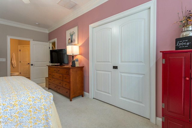 bedroom featuring light carpet, visible vents, baseboards, ornamental molding, and a closet