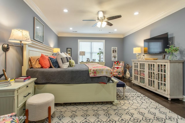 bedroom with a ceiling fan, ornamental molding, wood finished floors, and recessed lighting