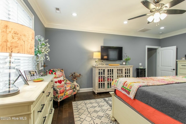 bedroom featuring baseboards, recessed lighting, wood-type flooring, and crown molding