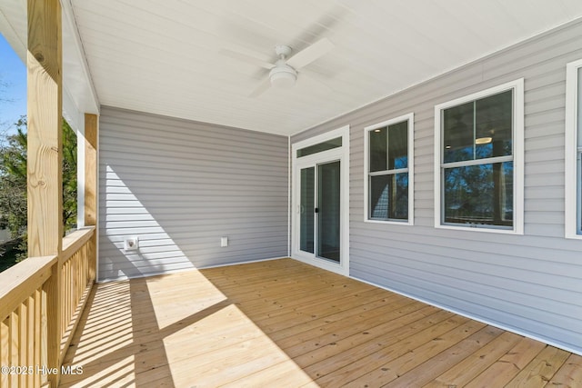 7103 E Yacht Dr, Oak Island, NC 28465 - deck featuring ceiling fan