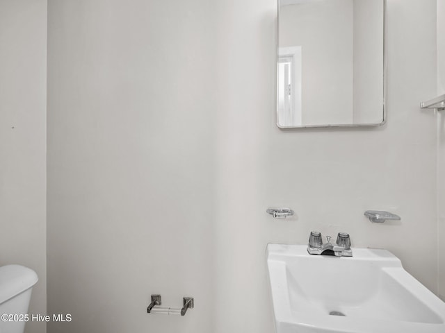 207 Cardinal Rd, Jacksonville, NC 28546 - half bath with a sink and toilet
