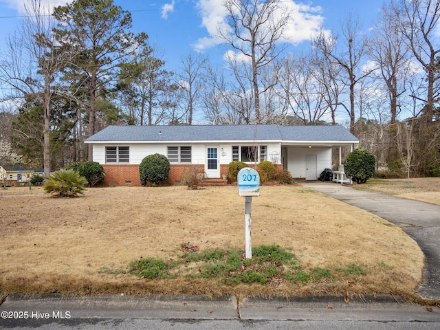 single story home with driveway, brick siding, roof with shingles, crawl space, and a front yard