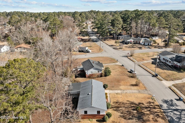 aerial view featuring a view of trees