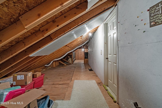 view of unfinished attic