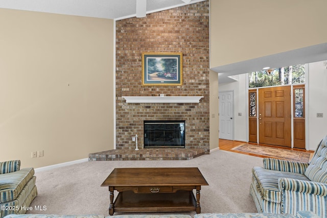 carpeted living room with a fireplace, baseboards, and lofted ceiling