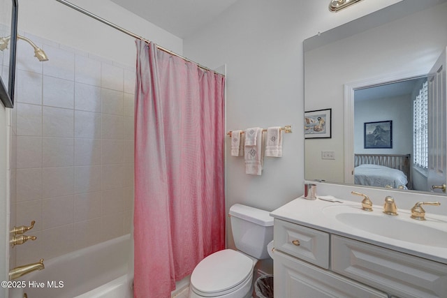 ensuite bathroom with shower / bath combo, vanity, toilet, and connected bathroom