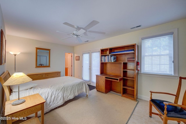 bedroom featuring visible vents, ceiling fan, and baseboards