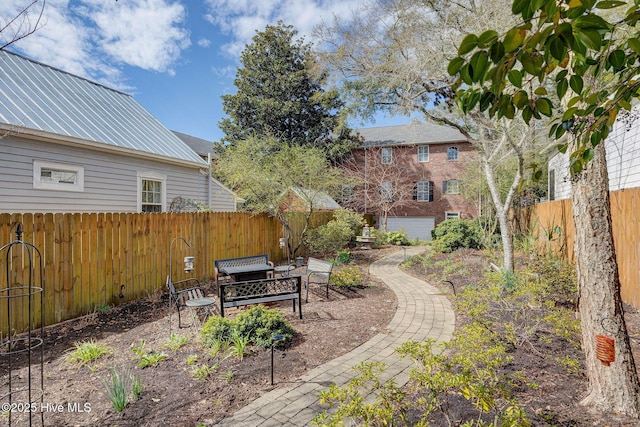 view of yard with a fenced backyard and a patio