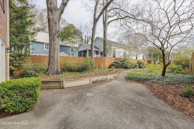 exterior space with a patio and fence