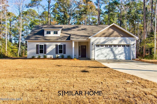 single story home with a front yard, driveway, and an attached garage