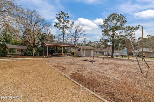 view of yard featuring a gazebo and an outdoor structure