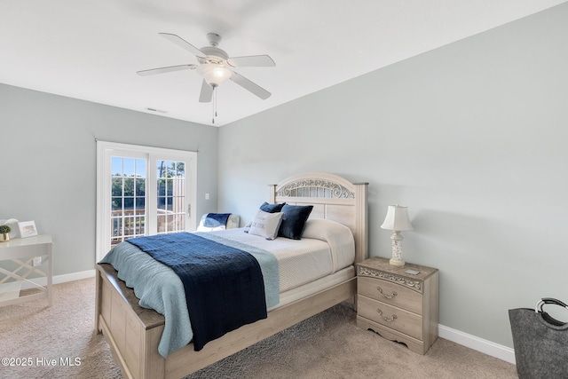 bedroom with visible vents, light colored carpet, baseboards, and ceiling fan