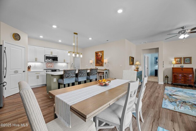 400 Frida Rd, New Bern, NC 28560 - dining room featuring light wood-style floors, ceiling fan, and recessed lighting