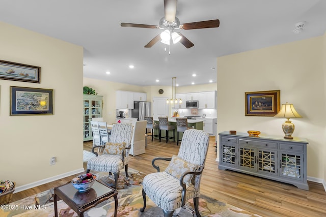 400 Frida Rd, New Bern, NC 28560 - living area featuring ceiling fan, light wood-style floors, baseboards, and recessed lighting