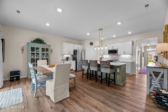 400 Frida Rd, New Bern, NC 28560 - dining area featuring light wood-style flooring, recessed lighting, and baseboards