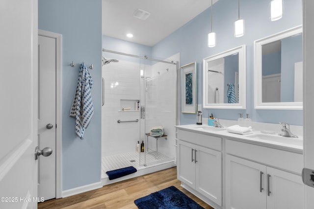 400 Frida Rd, New Bern, NC 28560 - full bath featuring a stall shower, wood finished floors, and double vanity