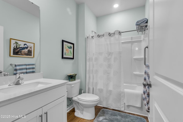 400 Frida Rd, New Bern, NC 28560 - full bathroom featuring vanity, toilet, shower / bath combination with curtain, and wood finished floors