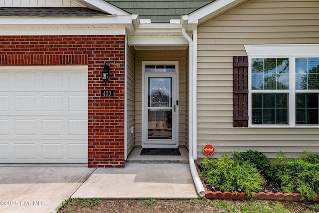 400 Frida Rd, New Bern, NC 28560 - entrance to property with brick siding and a garage