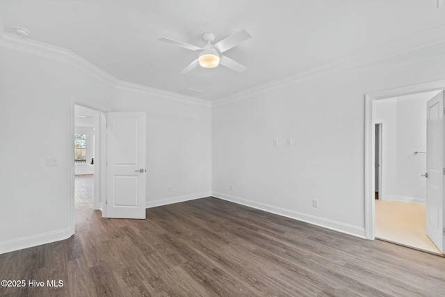 7105 E Yacht Dr, Oak Island, NC 28465 - empty room with ceiling fan, dark wood-style floors, baseboards, and ornamental molding