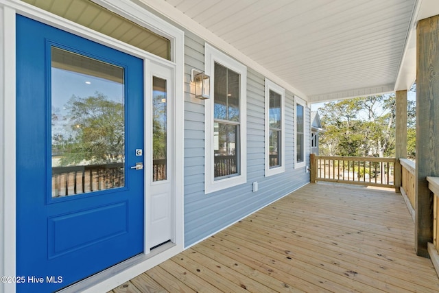 7105 E Yacht Dr, Oak Island, NC 28465 - view of wooden porch