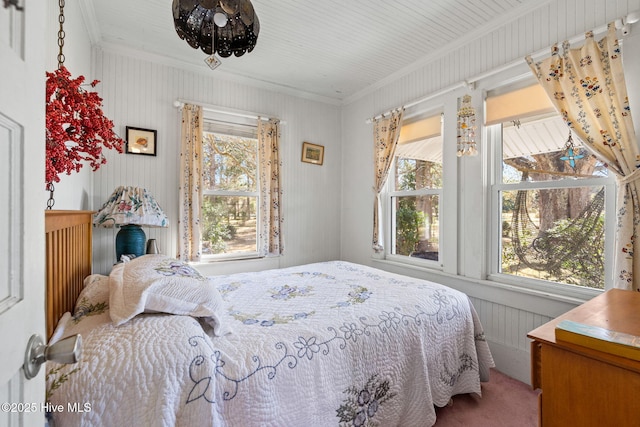 bedroom with ornamental molding