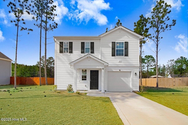 traditional-style home featuring driveway, an attached garage, fence, and a front lawn