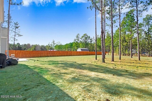 view of yard featuring fence