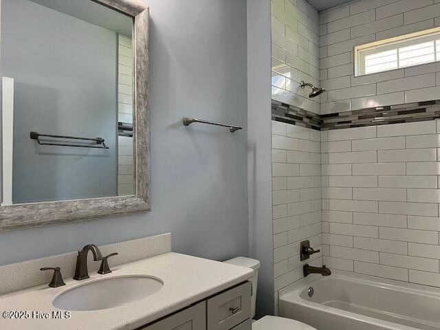 full bath with vanity, toilet, and shower / bathtub combination